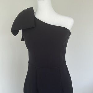 HOLIDAY CHIC! Safiyaa black one shoulder dress with bow and trailing tie.